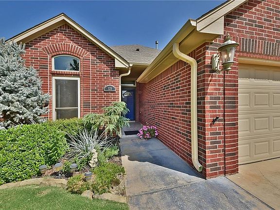 Front porch with wonderful landscaping