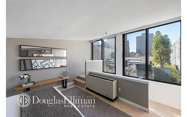 Sold by Douglas Elliman | media 12