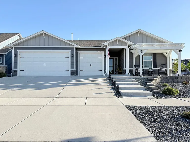 6784 Tumble Creek Dr — Photo 1