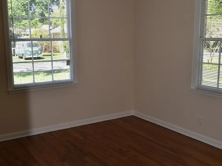 Bedroom. #1: Refinished floors, closet, decorative light