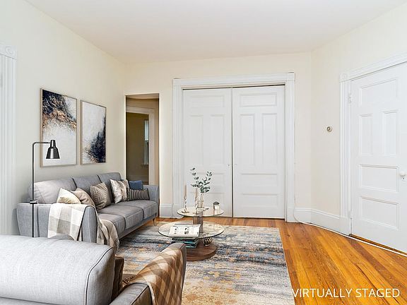 Living room off bedroom. Virtually staged