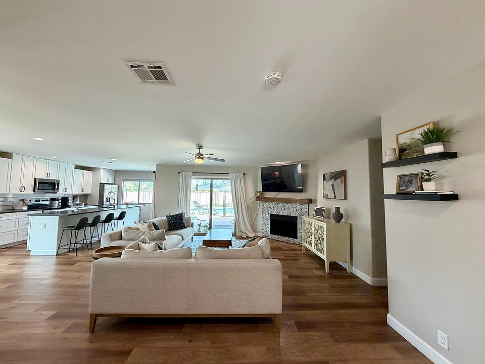 Bright open-concept living with seamless indoor-outdoor flow to your private pool oasis.