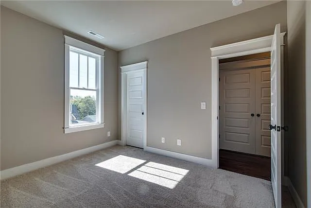 Large 2nd bedroom located in the front of the home