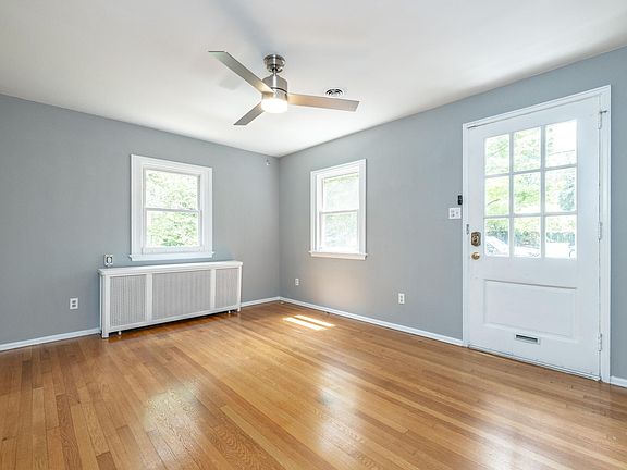 Sunlight Living Room with Ceiling Fan