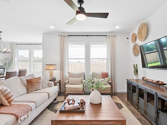 Great room with ceiling fan