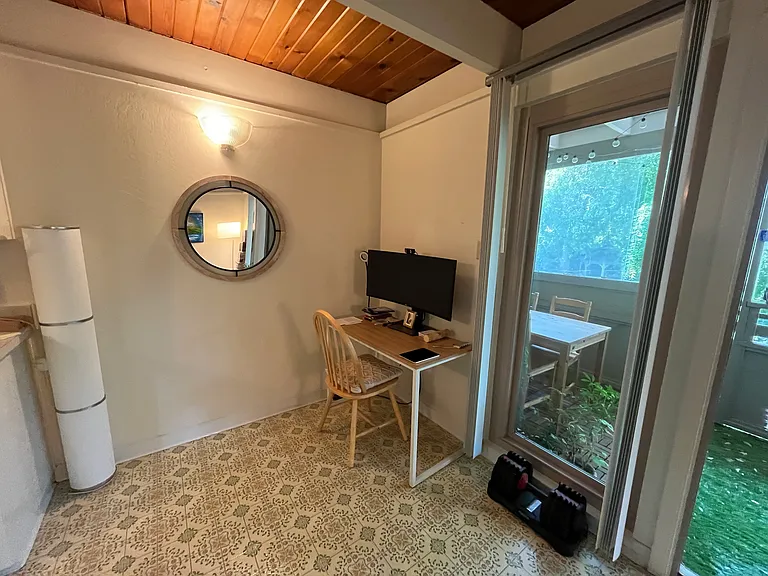 View from living room toward dining room and kitchen (Large 1BR upstairs)