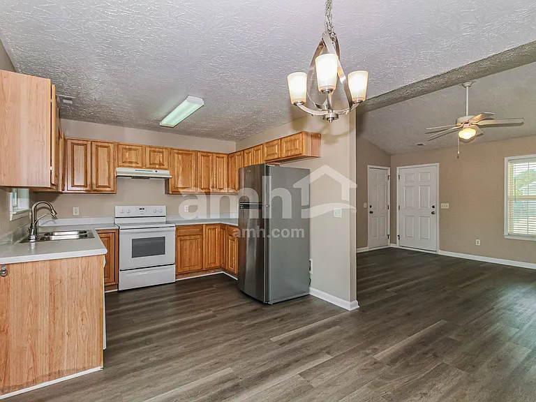 9488 NE Huckabee Ct — Photo 8