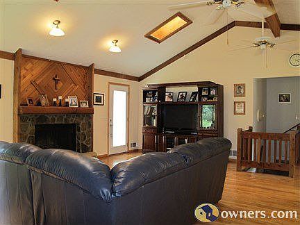 Great Room with fireplace and access to deckk