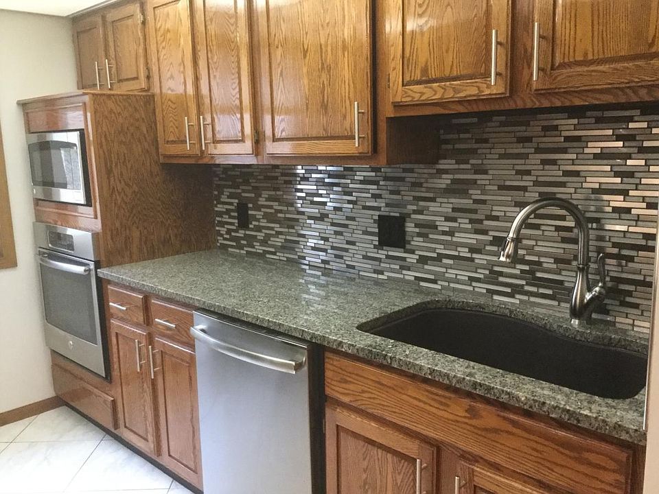 Kitchen with large sink and pull-down faucet
