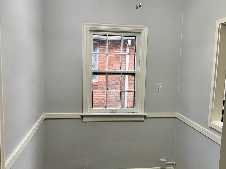 Eat-in kitchen area, ideal for a small table, breakfast nook, or extra storage.