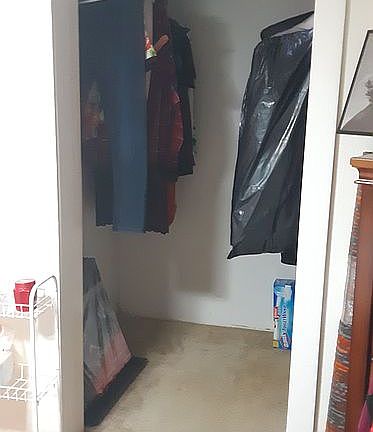Walk in closet in bedroom