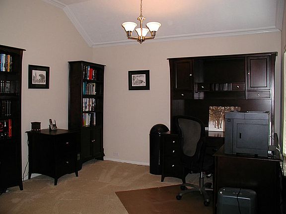Study offers high ceilings with crown molding ...