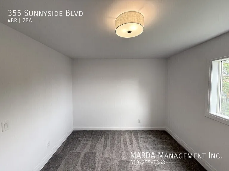 355 Sunnyside Blvd — Photo 29