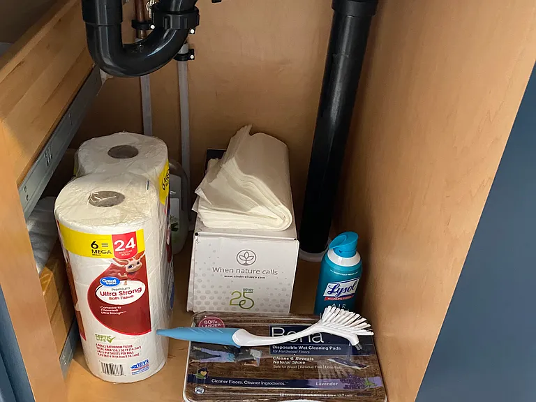 Under bathroom sink.