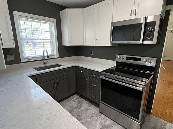 It's a very modern and efficient kitchen with all new appliances. There is plenty of counter space and storage including a party.