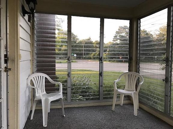 Attached screened porch