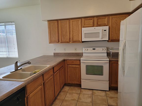 5th image of 8734 E Keats Ave