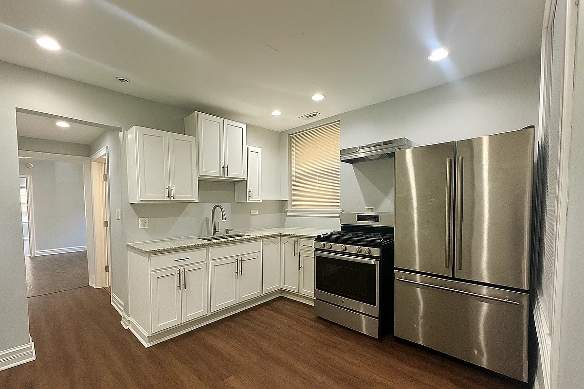 Building Photo - 1651 S Drake Ave #1