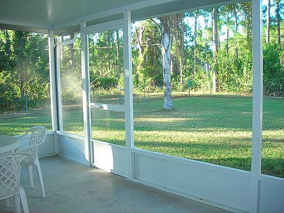 Screened Porch Overlooking Large Backyard