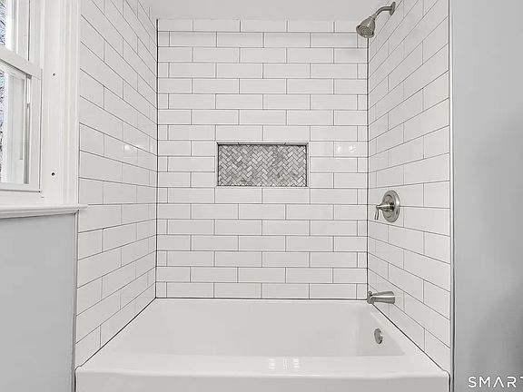 Bathroom shower stall all new tile