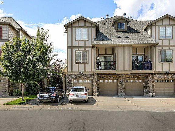 Unit with garage, deck, and parking