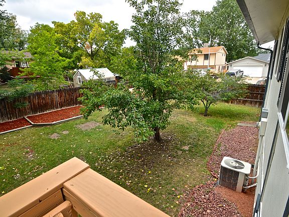 Deck overlooking backyard