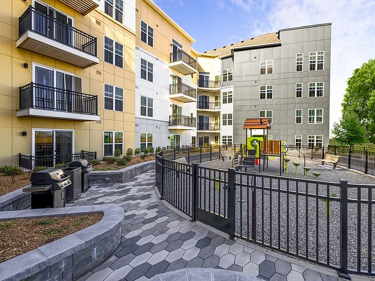Escape to your own oasis with private patios and balconies available in select homes at Modera Montville, offering views of our playground and courtyard.
