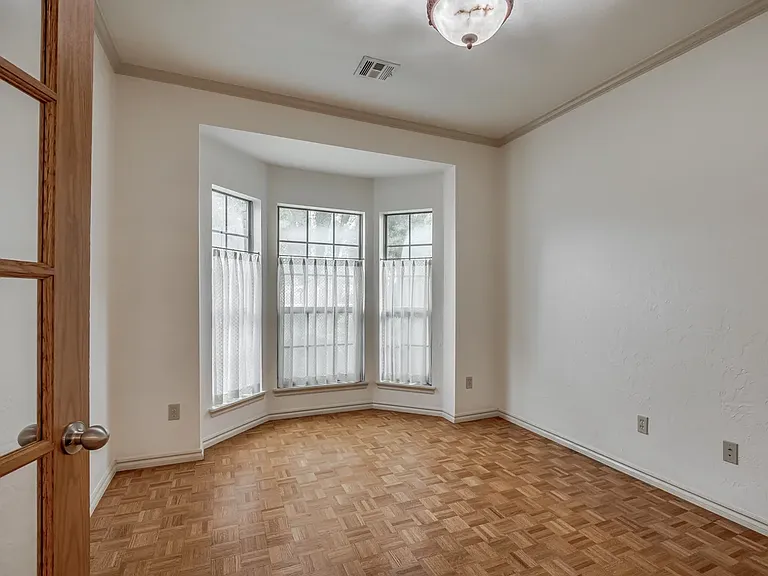 Study with French Doors overlooking front yard.
