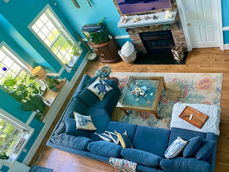 View of living room from 2nd story catwalk