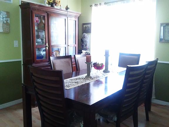 3rd image of 6942 NW Chapel Woods Ln