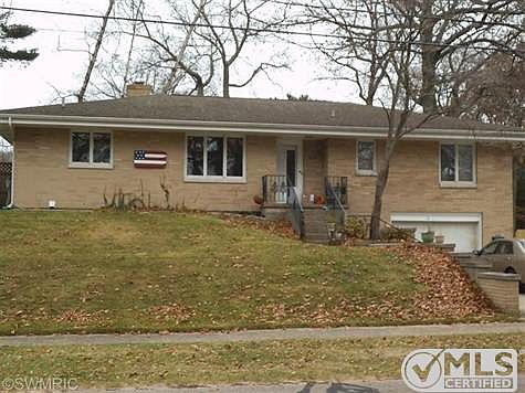 Appealing brick home located just around the corner from Lake Michigan!