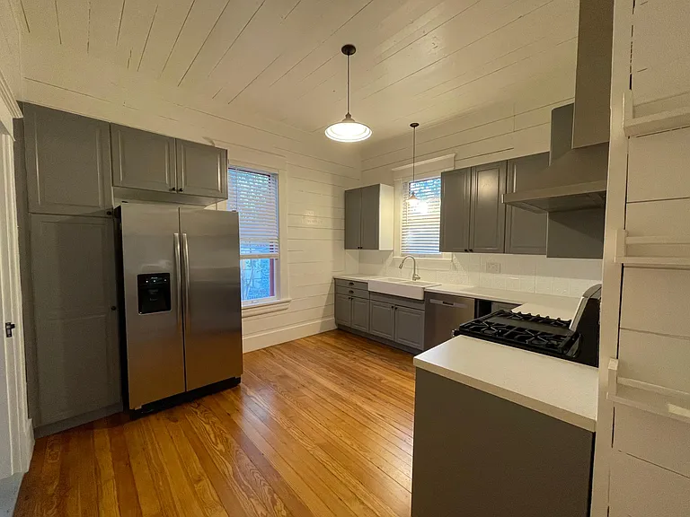 Kitchen is big enough for small table.