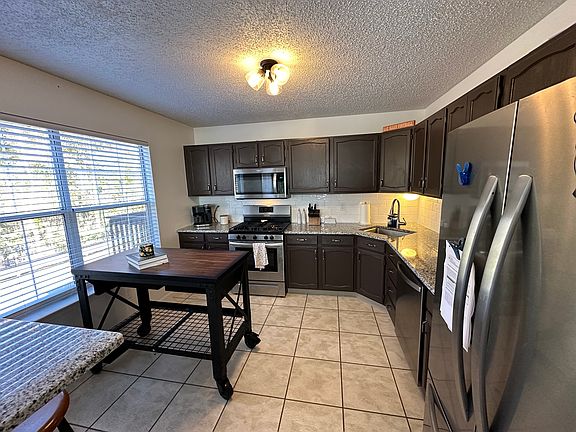 Kitchen with newly renovated countertops and new appliances