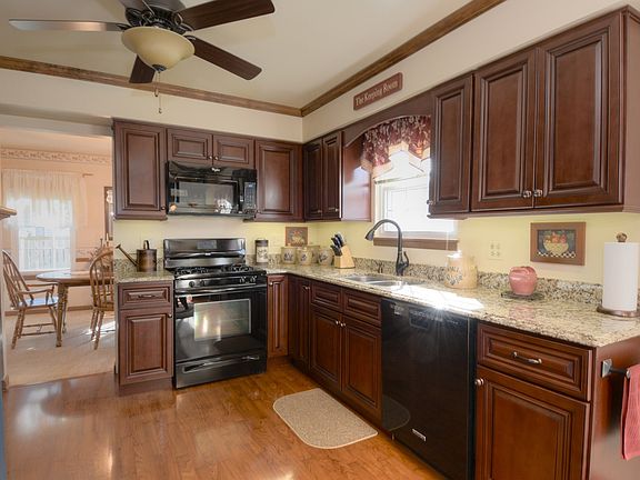Solid Cherry Cabinets with Pull Out Shelves, Slow Release Hinges