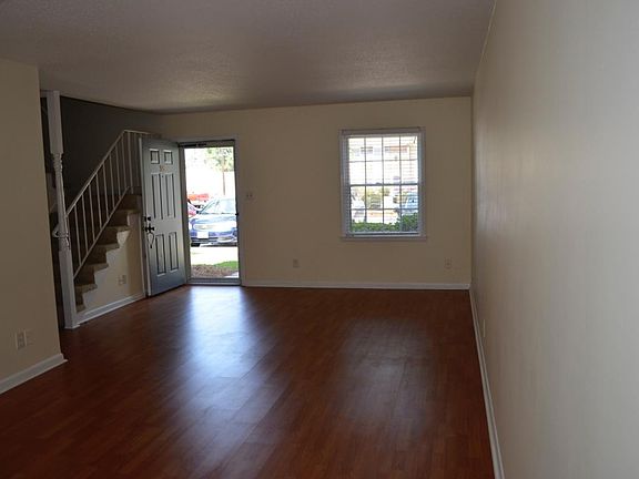 Looking at Front Door Standing in Dining Area