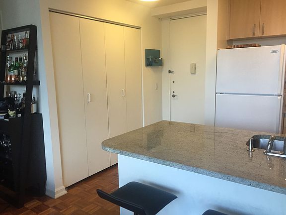 5th image of 510 W 52nd St APT 23H