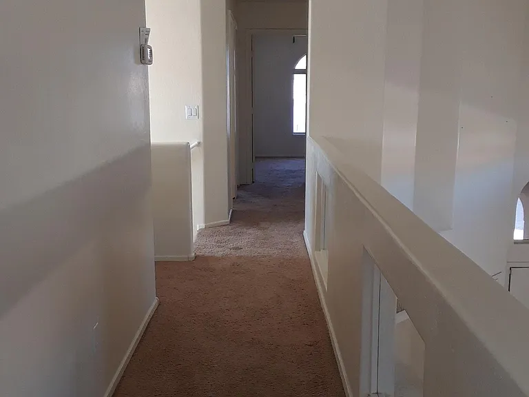 upstairs hallway/overlooking living room