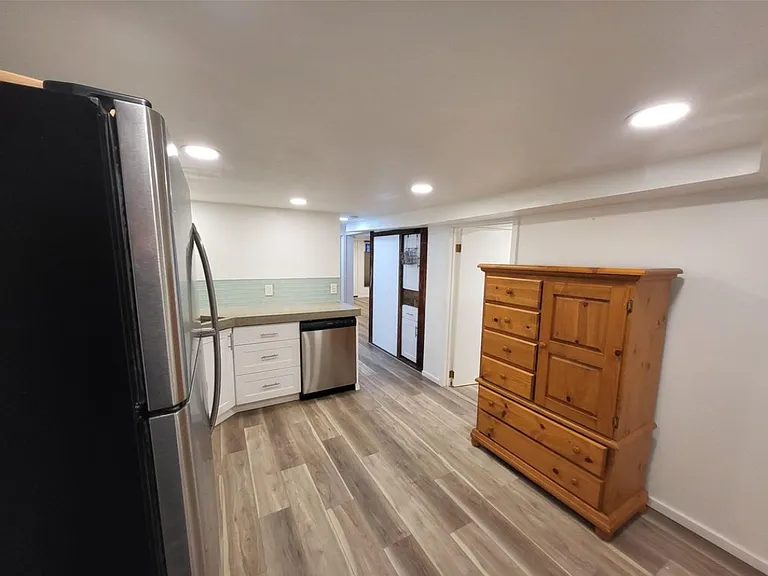 Kitchen and additional storage.