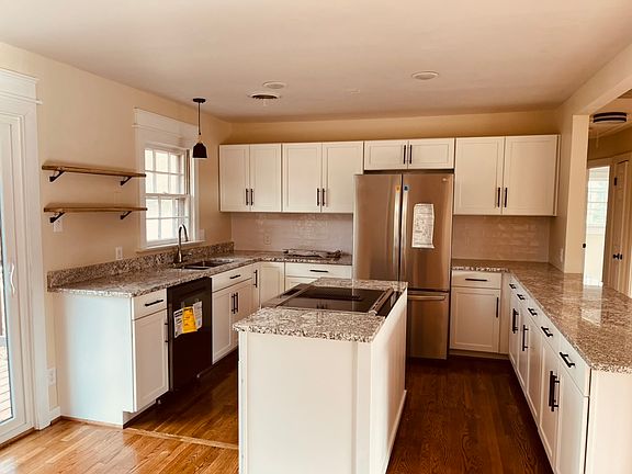 Kitchen has all new appliances and a ton of storage.