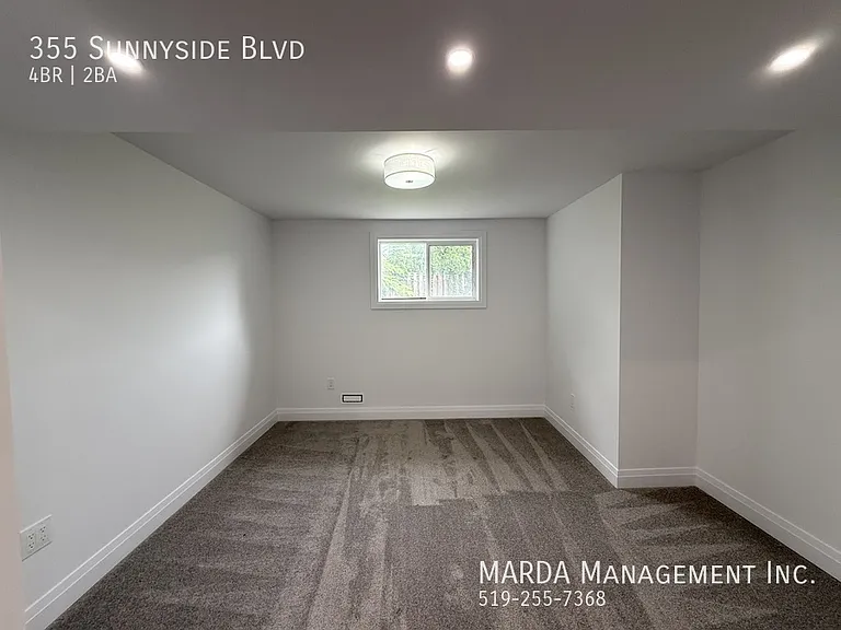 355 Sunnyside Blvd — Photo 46