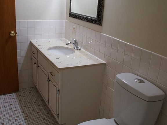 Vintage finishes in large bathroom