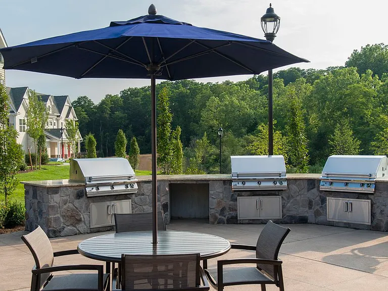 Outdoor lounge with barbecue grills