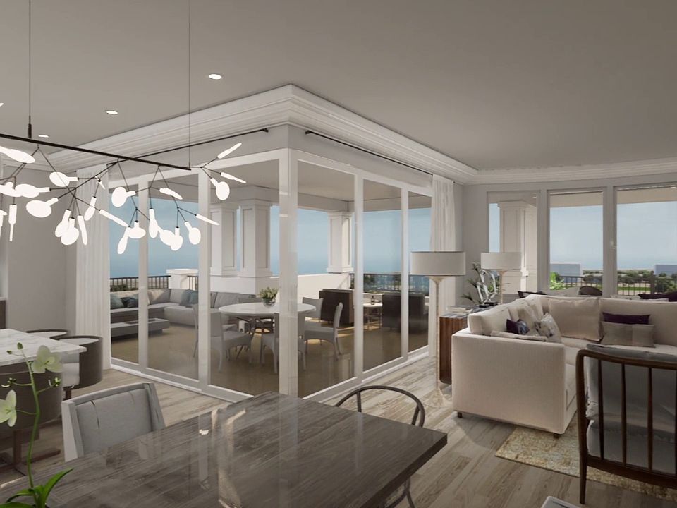 Impressive great room with access to wraparound veranda