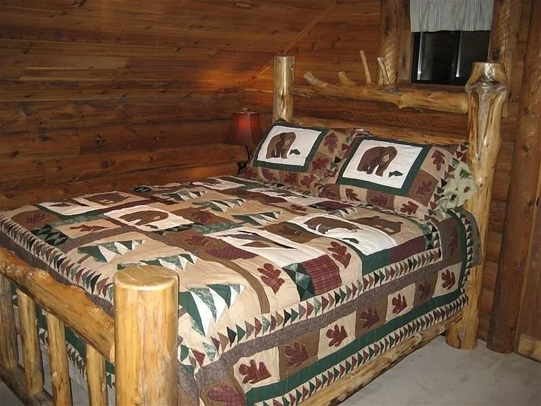 Two bedrooms, identical size with queen beds and small patios.