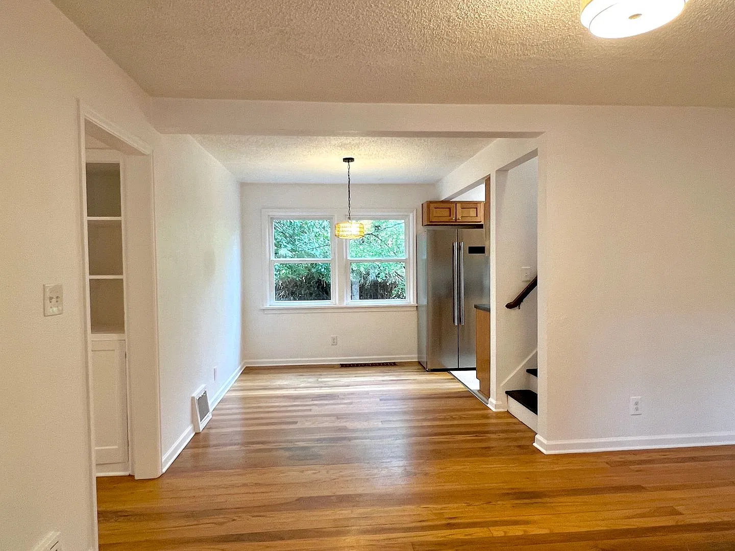 This beautifully updated home offers a bright and inviting atmosphere with modern amenities and u... — Photo 3
