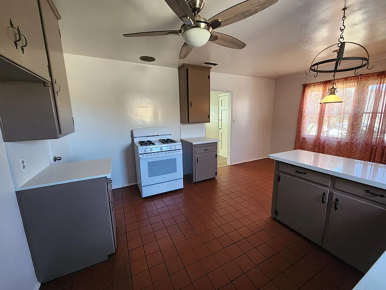 Kitchen and Dining Room - will have range, refrigerator, and dining room table and chairs