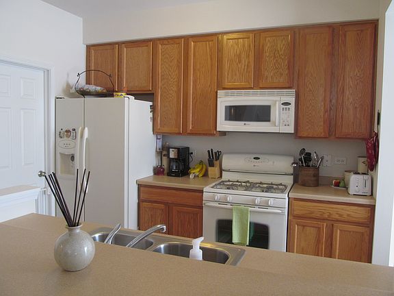 PLENTY OF SPACE FOR ALL THE KITCHEN ESSENTIALS PLUS WALK IN PANTRY.