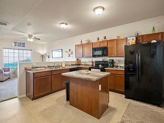1st floor Large Kitchen, island (with outlets) and newer appliances