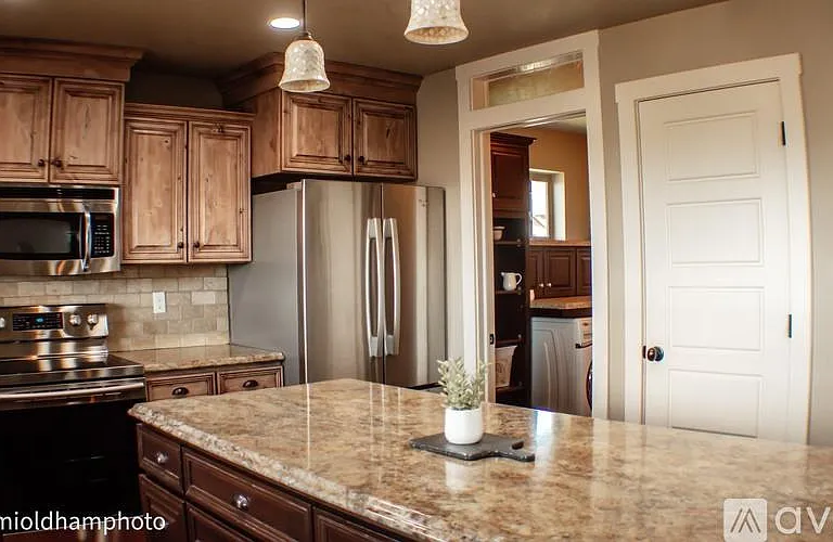Kitchen looking into laundry room
