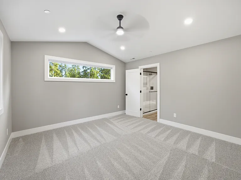 Master Bedroom, vaulted ceiling & fan w/ ensuite bathroom.